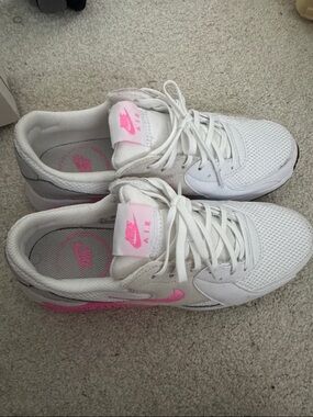 Nike Women’s White Sneakers with Pink Swoosh